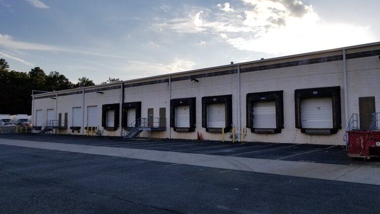 Loading docks along the side of the Richmond, Virginia distribution center at dusk